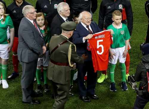 President attends the soccer match between Ireland and Wales