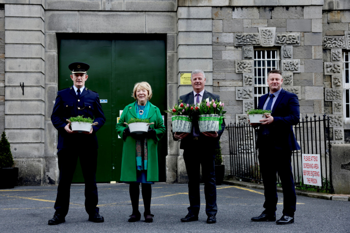 Sabina Higgins presents bowls of shamrocks to a number of prisons in Dublin