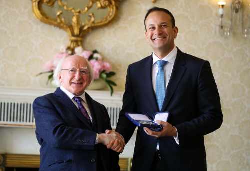 President Higgins gives both the Seal of the Taoiseach and the Seal of Government to the newly appointed Taoiseach Leo Varadkar