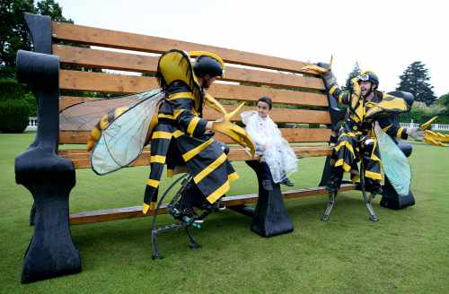 Juan Ignacio Collins age 6 from Kill Co Kildare with Busy Bees on left  Andrew Kavanagh and  Fintan Lawlor from Bui Bolg Theatre company Co Wexford
