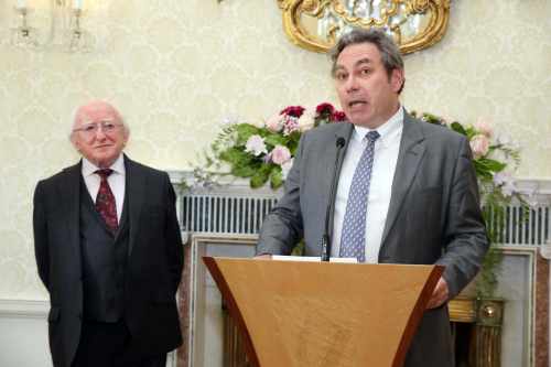 President Michael D. Higgins listens to a speech by Mark Kelly, ICCL Director at the reception to mark 40 years of the council