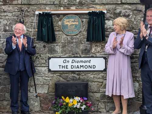 President unveils a plaque to mark Glaslough’s achievement in winning the 2019 Tidy Town Competition