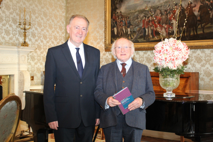 President receives Mr. Vic Merriman who presents a copy of his book “Austerity and the Public Role of Drama Performing Lives-in-Common”