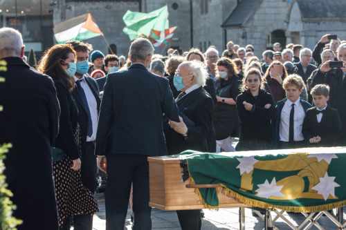 President Higgins attends the funeral of former Siptu official Manus O’Riordan