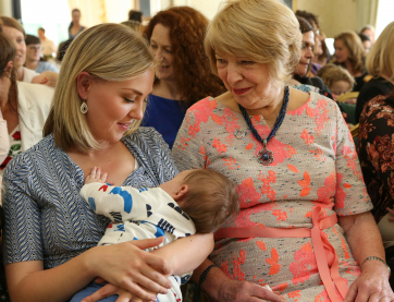 Sabina Higgins chats to Fiona Nea, from Knocklyon, Dublin, while she feeds her son Charlie