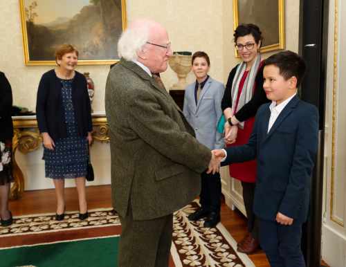 Oisin McLoughlin meeting President Higgins.