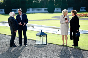 H.E. Mr. Nicos Anastasiades, President of the Republic of Cyprus, President Michael D. Higgins, Andri Anastasiades and Sabina Higgins in the grounds of Aras after tree planting.