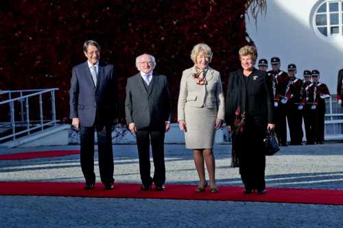 H.E. Mr. Nicos Anastasiades, President of the Republic of Cyprus and President Michael D. Higgins , Andri Anastasiades, spouse of the President of the Republic of Cyprus and Sabina Higgins in the grounds of Aras