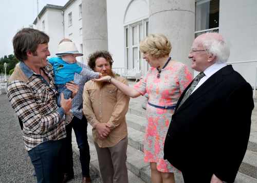 Chris White with his son Ryan White ( aged 1), Fergus Packman from Oldtowns Rounders, Co.Galway, Sabina Higgins and President Michael D Higgins.