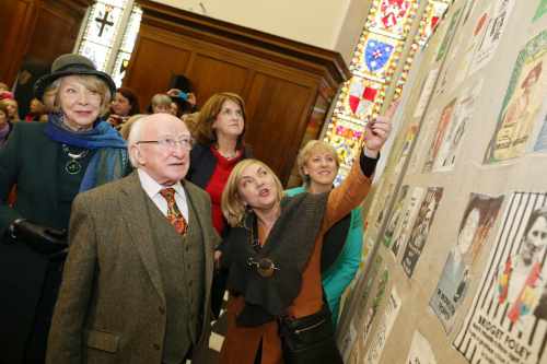 Marge Almqvist shows President Michael D.Higgins, his wife Sabina ,Tanaiste Joan Burton and Minister for Arts, Heritage and the Gaeltacht Heather Humphreys TD a patchwork quilt with a panel dedicated to each notable woman from the 1916 rising