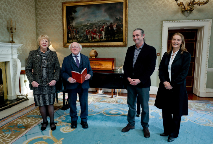 President receives Mr Niall Henry, Blue Raincoat Theatre Company, who will present a copy of The Book of Sligo
