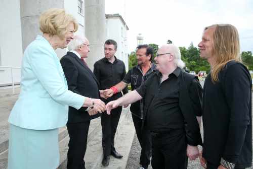 Pic shows President Higgins and his wife Sabina as they meet with Bagatelle from left  Paul Byrne , Ken Doyle , Liam Reilly and Kurt Shefter