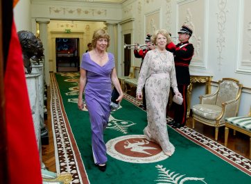 Sabina Higgins with Ms Daniela Schadt as they make their way down the Francini corridor in Aras An Uachtarain for State Dinner