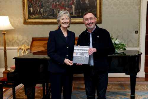 President Connolly receives Mr. Eoin O’Broin TD for a book presentation