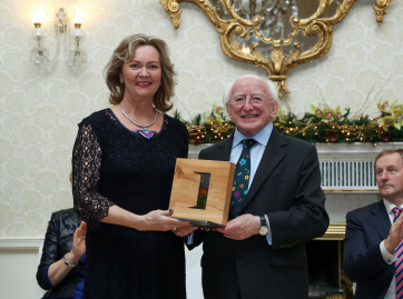 Angela Brady with her award in the Arts, Culture and Sport category