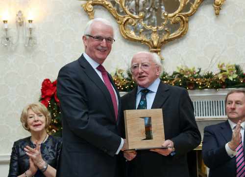 Gerald Lawless with his award in the Business and Education category