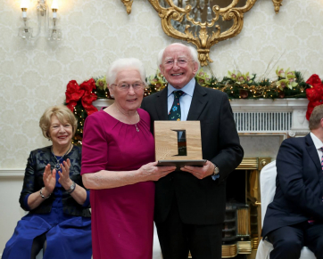 Nora Higgins with her award in the Irish Community Support category