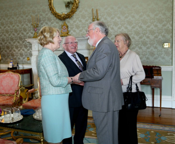 President Higgins hosts reception for Comhlamh , a member and supporter organization to anyone interested in social justice , human rights and global development on the occasion of their 40th anniversary in Aras An Uachtarain