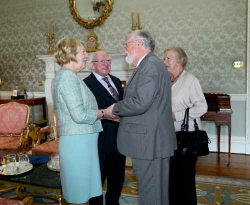 President Higgins hosts reception for Comhlamh , a member and supporter organization to anyone interested in social justice , human rights and global development on the occasion of their 40th anniversary in Aras An Uachtarain