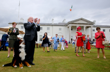 Pic shows President Higgins as he enjoys the music being played during one of the summer Garden parties