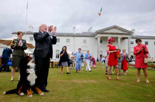 Pic shows President Higgins as he enjoys the music being played during one of the summer Garden parties