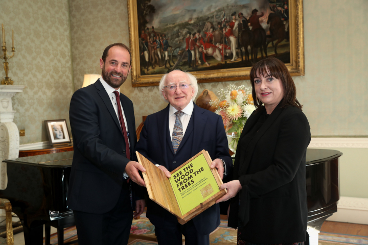 President receives representatives from GMIT Letterfrack who present a copy of their book “See the Wood from the Trees”