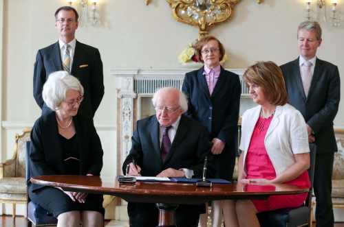 Pic shows President Higgins with Ms Mary Ellen Ring, SC appointed as Judge of the High Court .