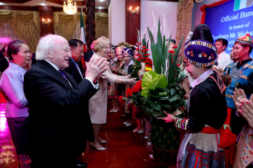 President Higgins and his wife as they meet the Traditional dancers who performed at the State Dinner
