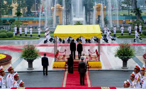 President Michael D. Higgins in the Presidential Palace with President of the Socialist Republic of Vietnam H.E. Tran Dai Quang as he inspects a guard of Honour in the city of Hanoi