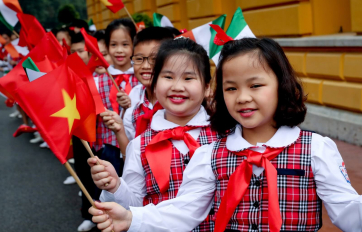 Local school kids waiting to greet President Michael D Higgins