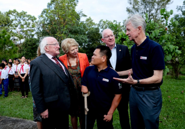 President Higgins, Sabina, Minister for Foreign Affairs and Trade Charlie Flanagan as they meet with Chuck Searcy International Advisor and Survivor Mr Thi