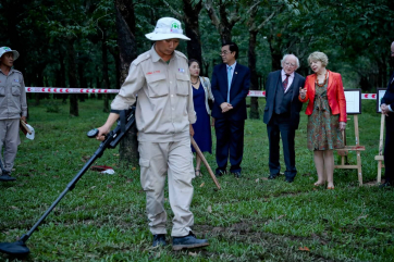 President Higgins his wife Sabina as they visit Cluster Munition Remnant Survey Site and watch the process and observe demonstration near Dong Ho city