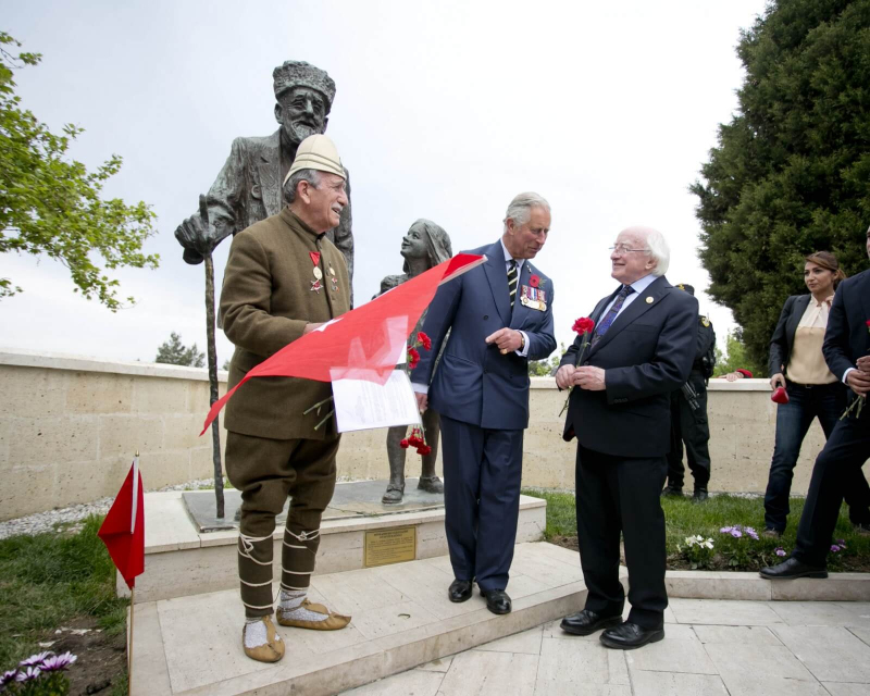 HRH Prince Charles invites President Michael D Higgins to meet a Turkish Veteran at a statue to the Oldest Turkish Veteran, 'Huseyin Kacmaz' who died in 1994 at the age of 110  at the Memorial to the Martyrs of the Turkish 57th Regiment at Gallipoli 