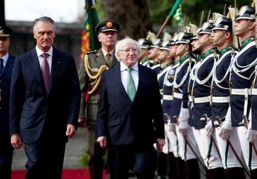 President Michael D Higgins with President of Portugal, Cavaco Silva at Belem Palace in Lisbon inspecting the Guard of Honour