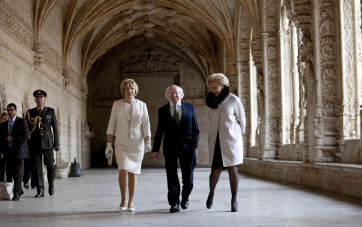 President Michael D Higgins and his wife Sabina with Isabel Cruz de Almeida, Director, Monastery of Jeronimos in the Cloisters of the Monastery of Jeronimos in Lisbon