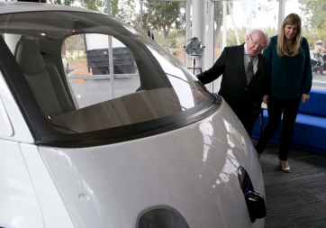 President Higgins is pictured  with the Google Driverless Car at Google Offices with Lorraine Twohill, Chief Managing Officer, Google