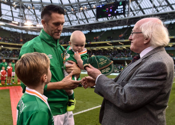 President Michael D. Higgins presenting Robbie Keane with his 146th and last International Cap. Phot