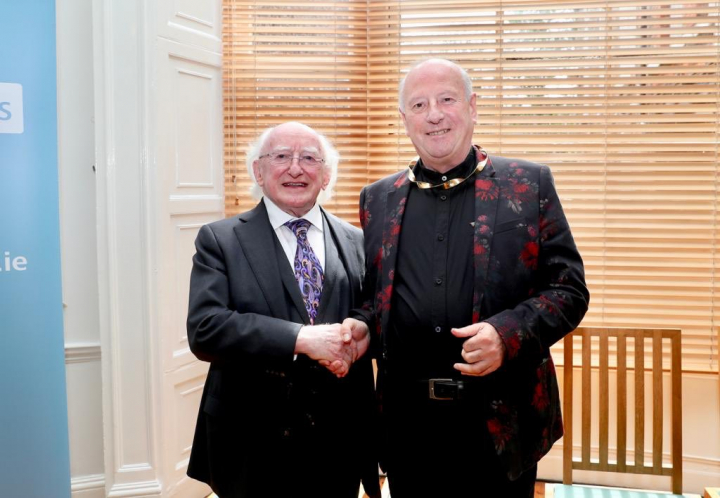 President confers the Torc, Symbol of the Office of Saoi, on Mr. Roger Doyle