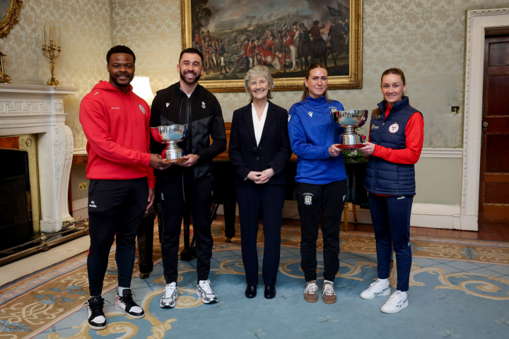 President Connolly receives the 2026 President’s Cup Men and Women Team Captains