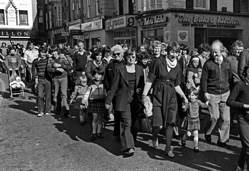 Michael D Higgins and his wife Sabina with their daughter Alice Mary while taking part in a 'Sport For All' day walk through Galway city centre in October 1978.   Photograph: Joe O'Shaughnessy.  October 1978