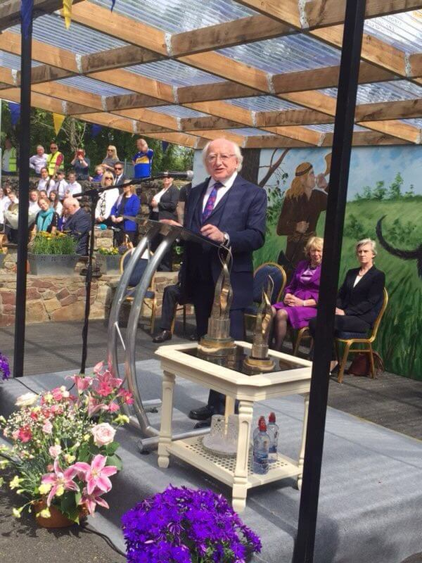 President unveils a plaque to mark Birdhill winning the 2017 Tidy Towns Competition