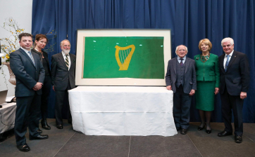 President Michael D.Higgins and his wife Sabina with the original Citizen Army flag which flew over Liberty Hall on Easter Week 1916