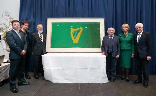 President Michael D.Higgins and his wife Sabina with the original Citizen Army flag which flew over Liberty Hall on Easter Week 1916