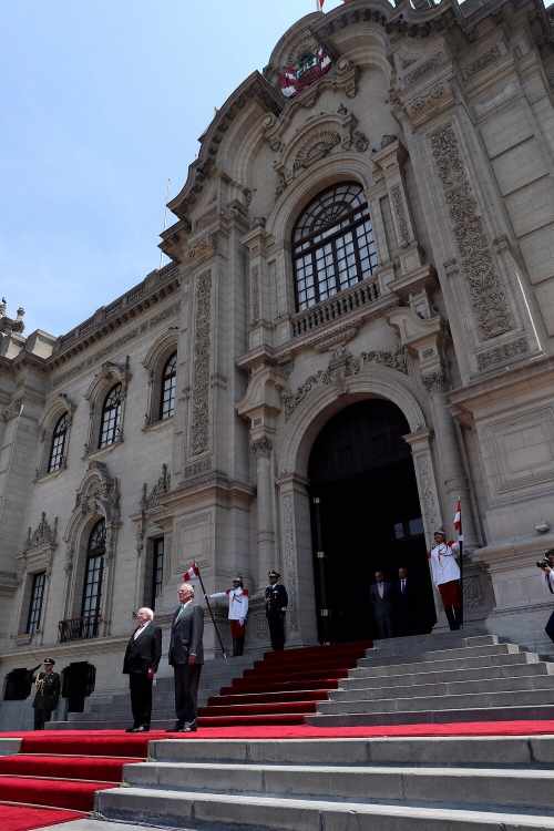 President Higgins with President Kuczynski as they listen to National anthems at the Government Palace in the city of Lima in Peru